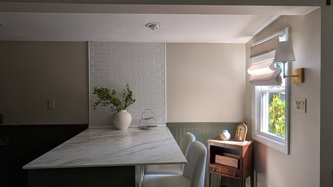 Kitchen with subway tile and thinscape calcutta blanc countertops