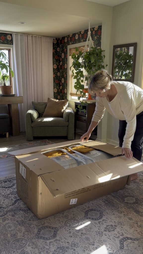 Vacuum-sealed couch delivered in a compact box before unboxing