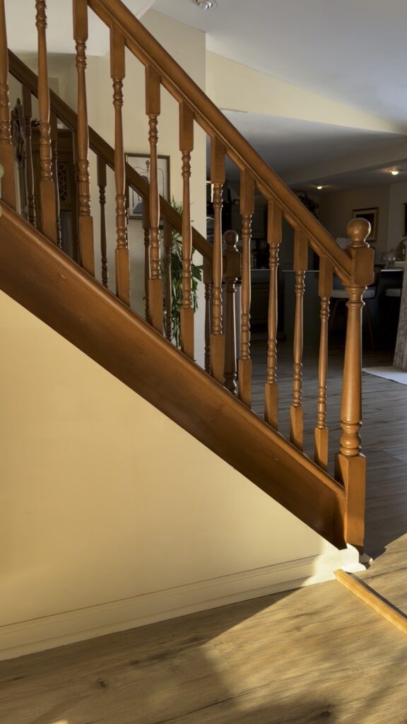 painted staircase with wood look finish side view