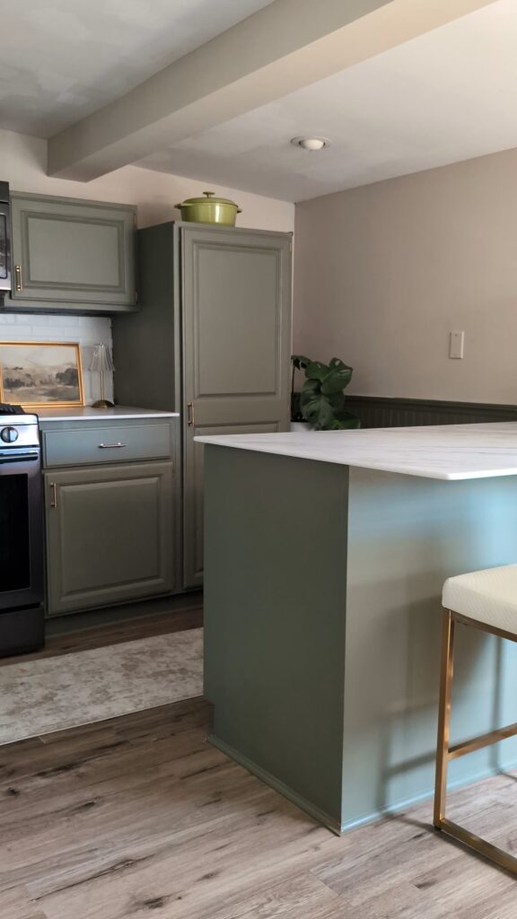 kitchen painted sage green transitional phase before final design
